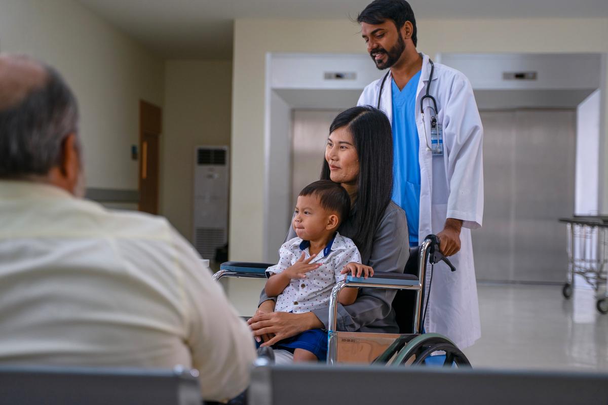 TX Hospitals Banjara Hills Doctor with Patient and Child